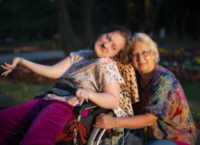 Can an existing 65-year-old single resident request to have their disabled adult child move into the property
